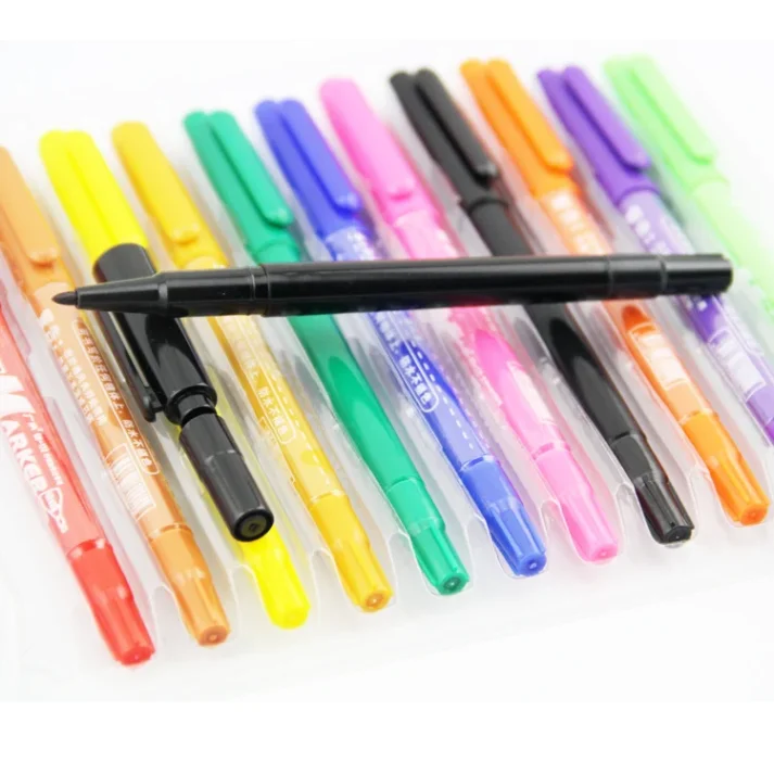 Marker pen and design tools on a table