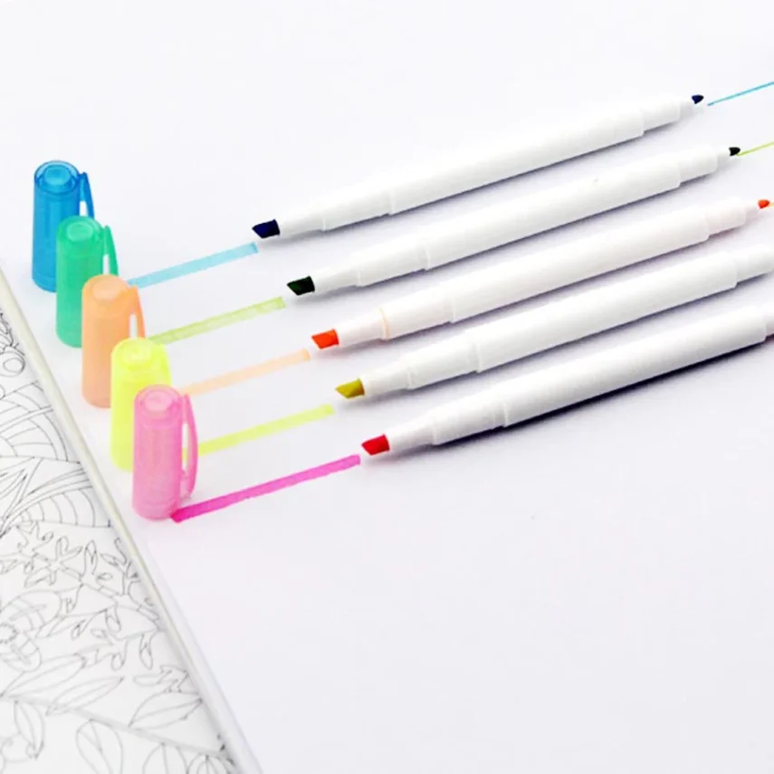Collection of art markers ideal for sketching and drawing.