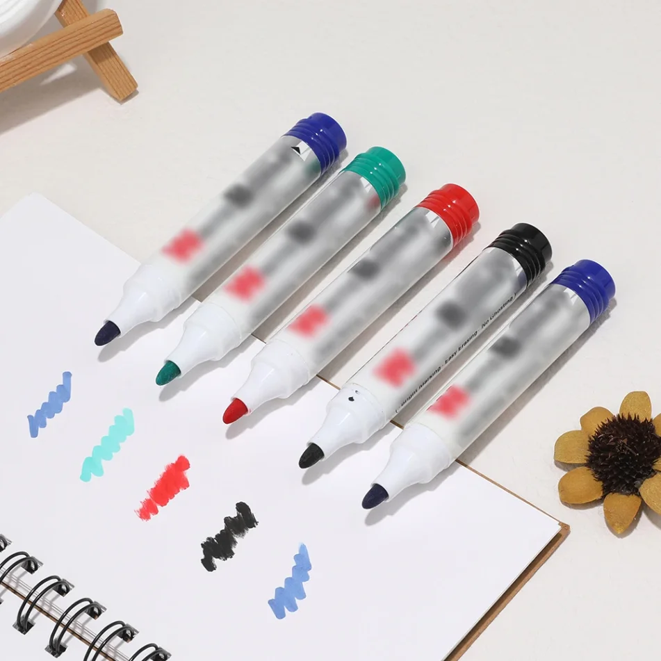 Collection of art markers ideal for sketching and drawing.