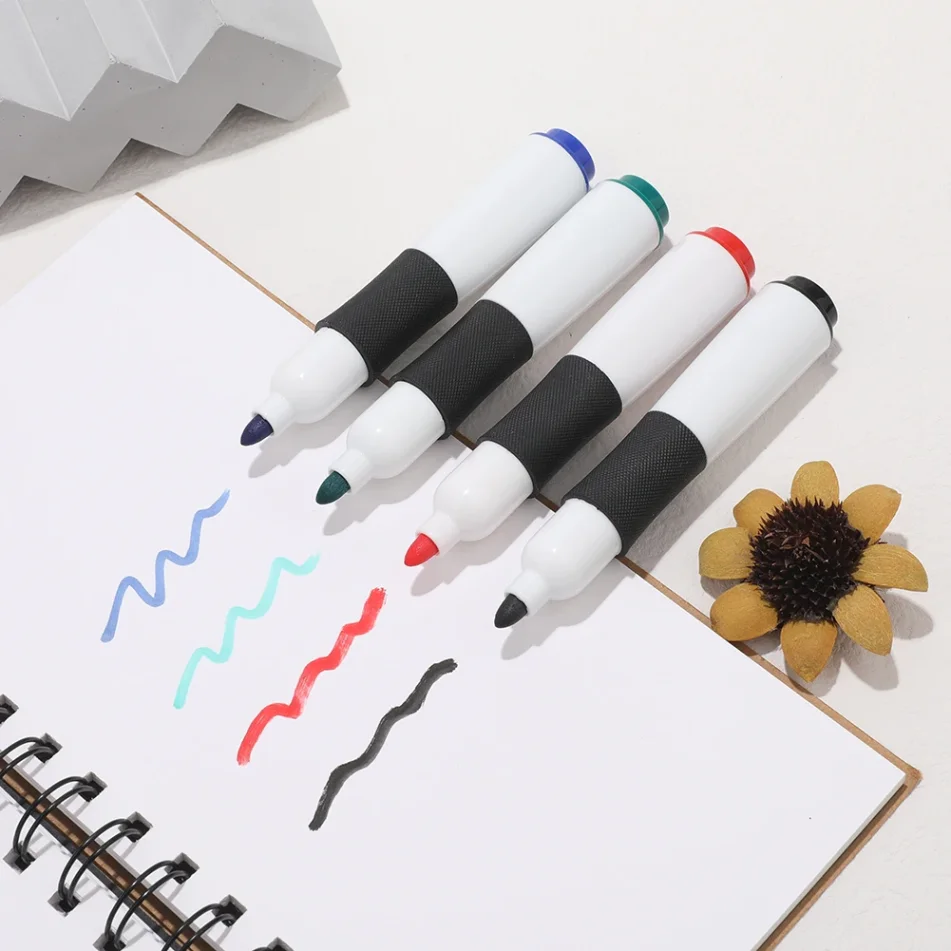 Assortment of art markers in various colors.