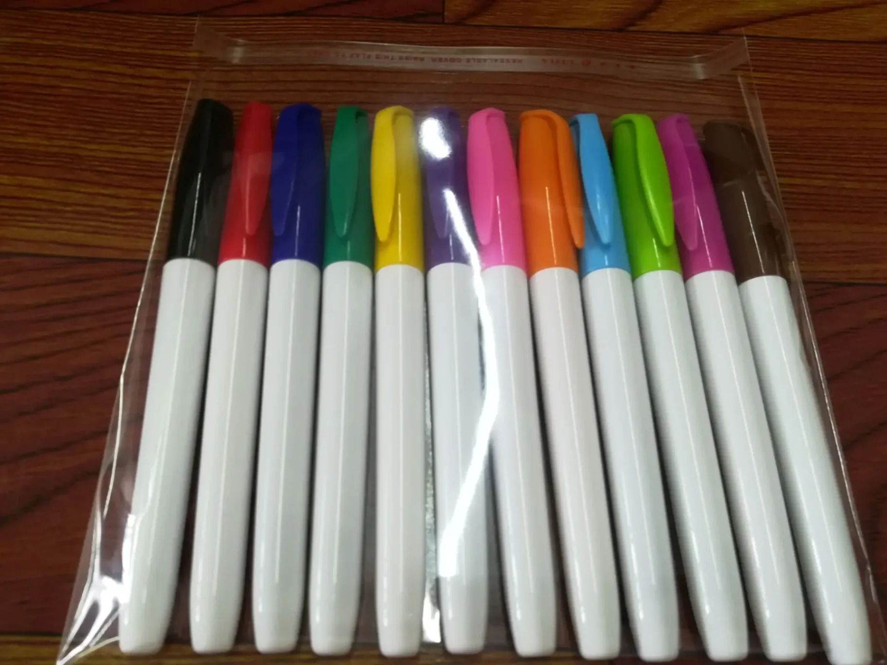 High-quality marker pens and design tools on a white background