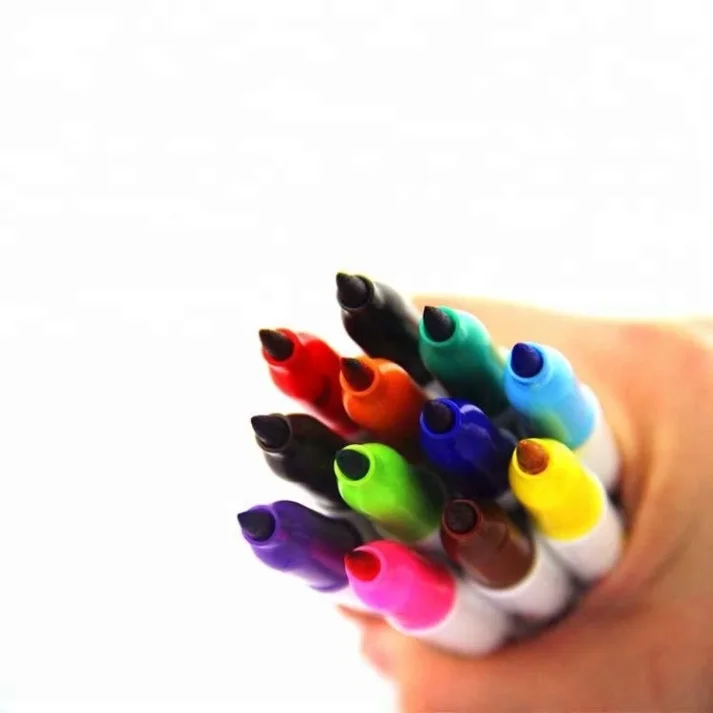 Collection of art markers in assorted colors.