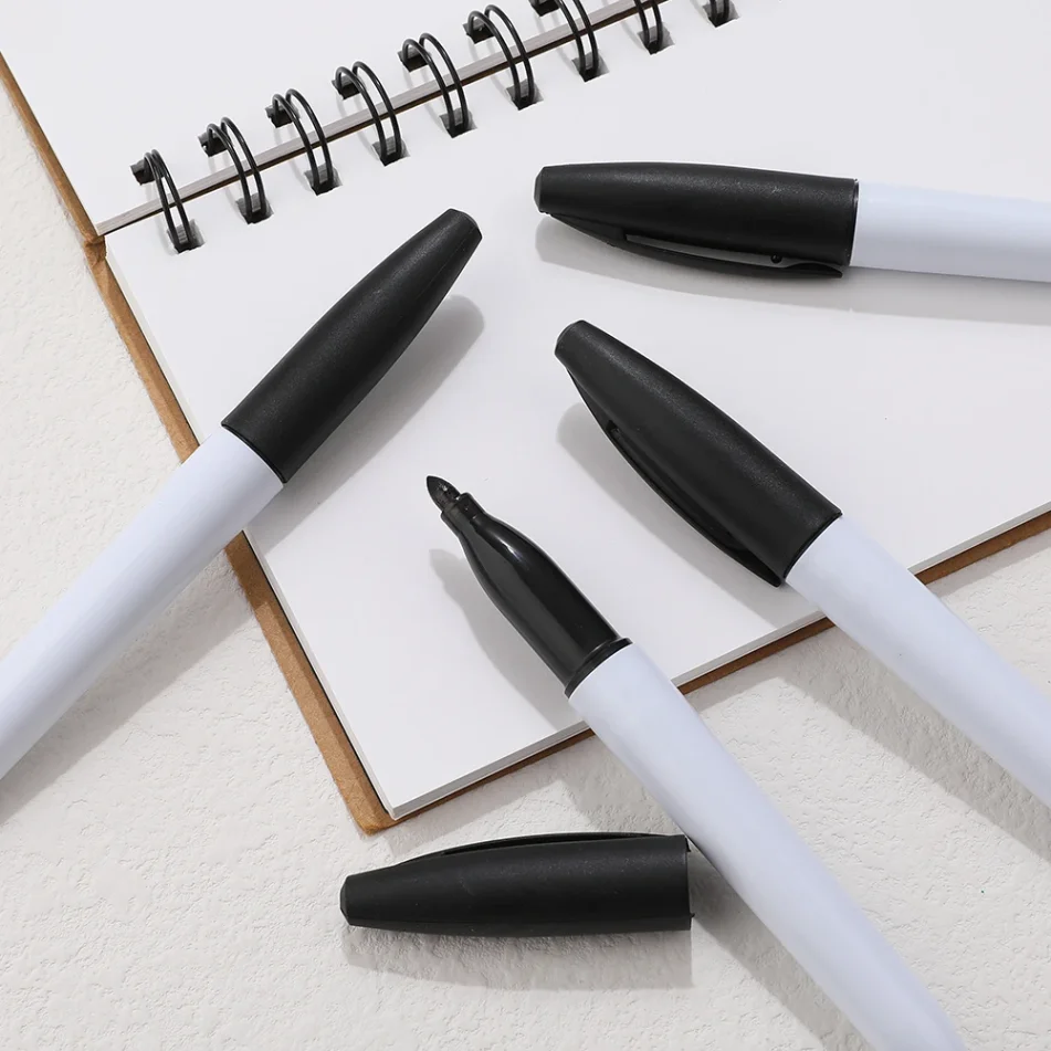 Art supplies including a variety of marker pens.