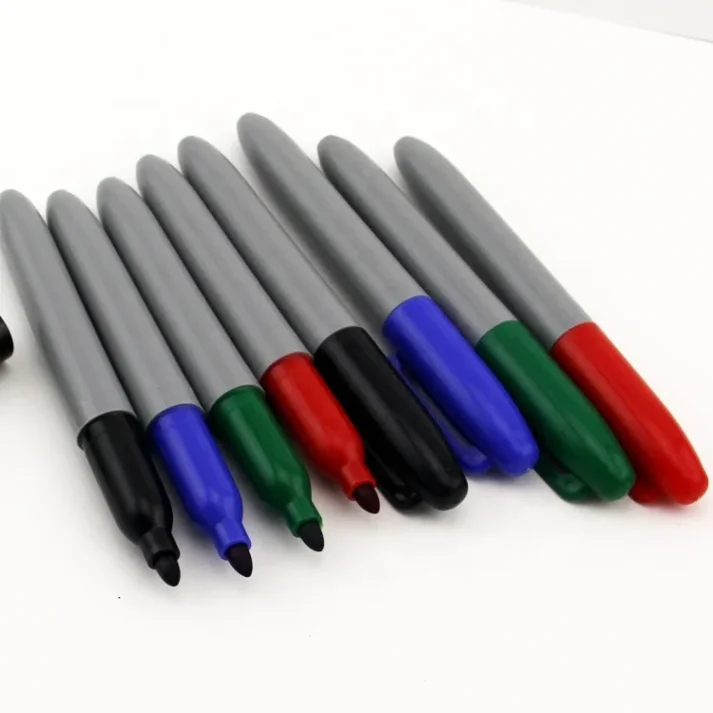 A collection of art supplies including paints, brushes, and palettes.