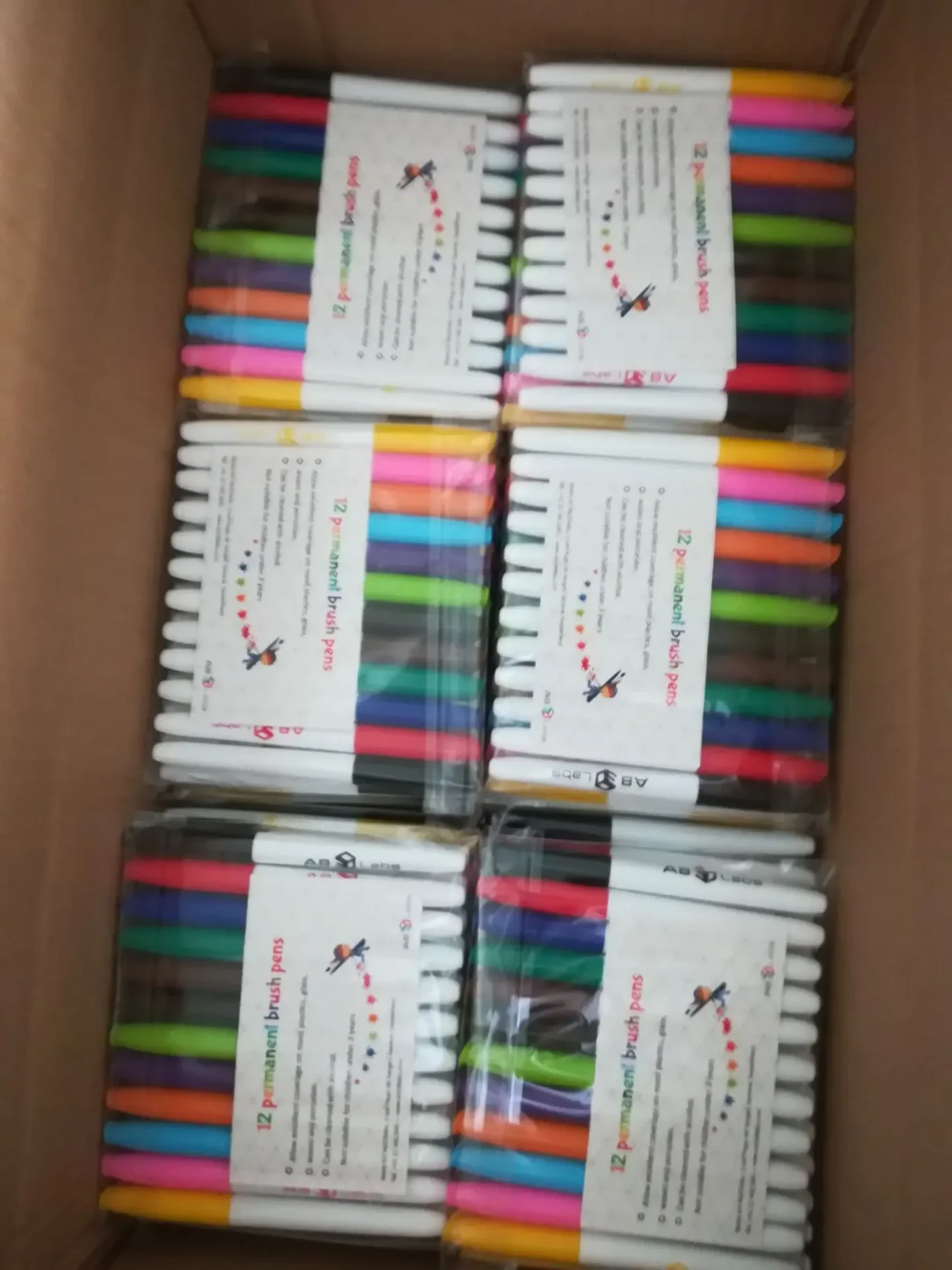 A colorful set of markers arranged neatly for artistic use