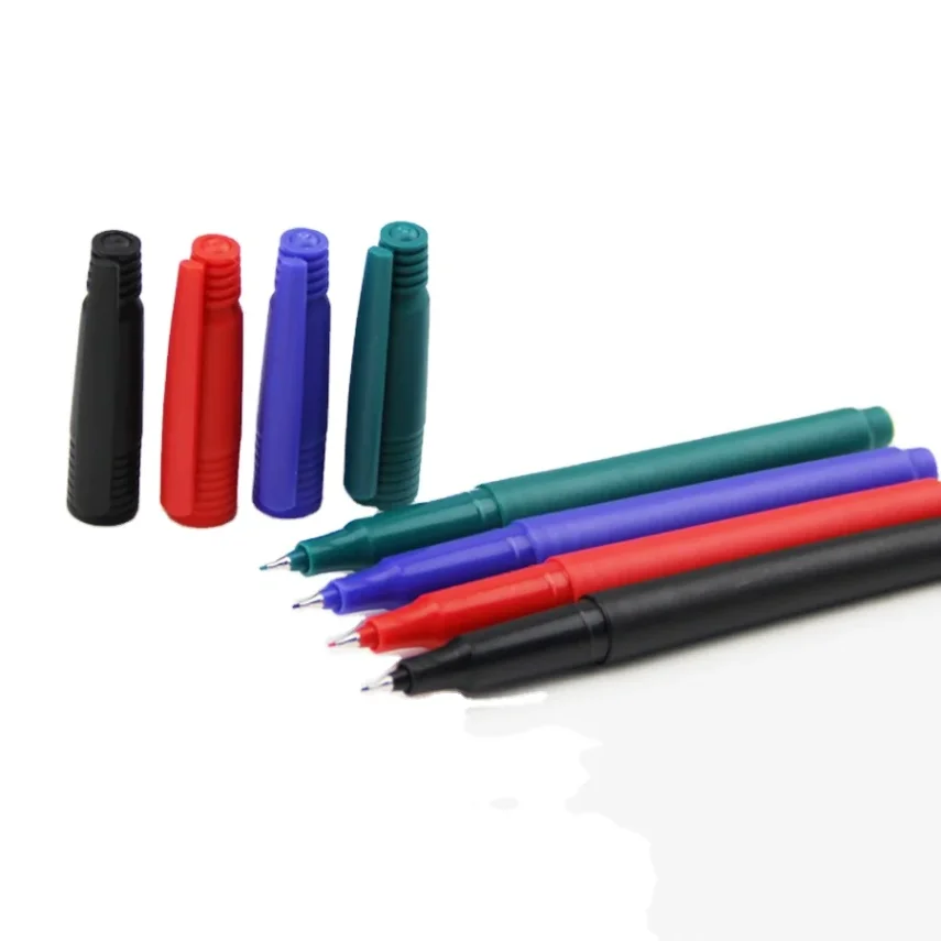 Marker pen and design tools on a table.