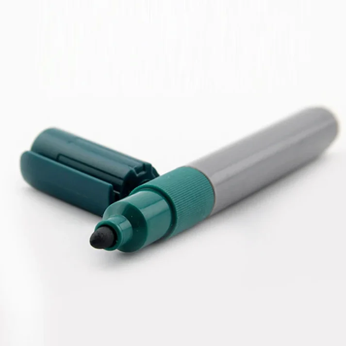 Collection of art markers in assorted colors.