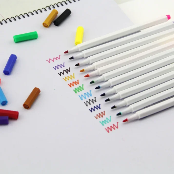 Colorful marker pens arranged neatly.