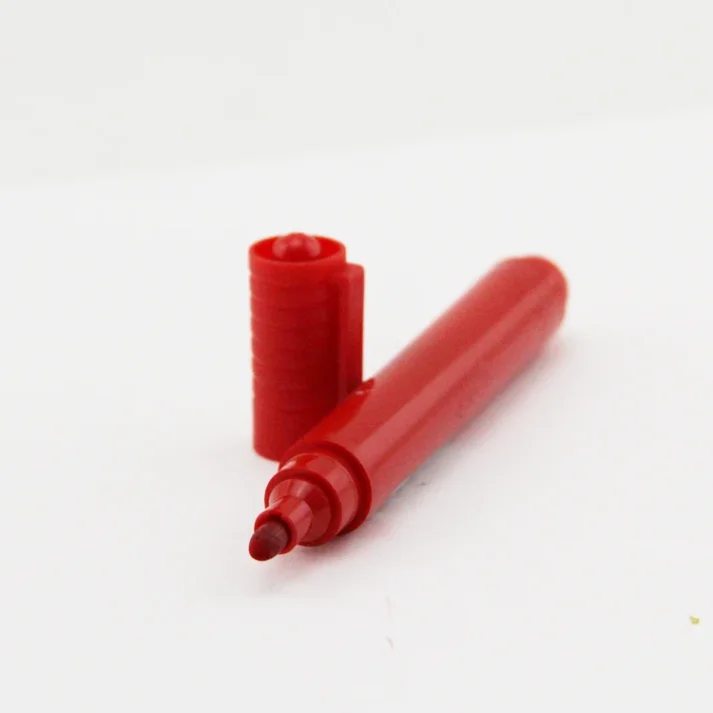 Collection of art supplies including markers in various colors