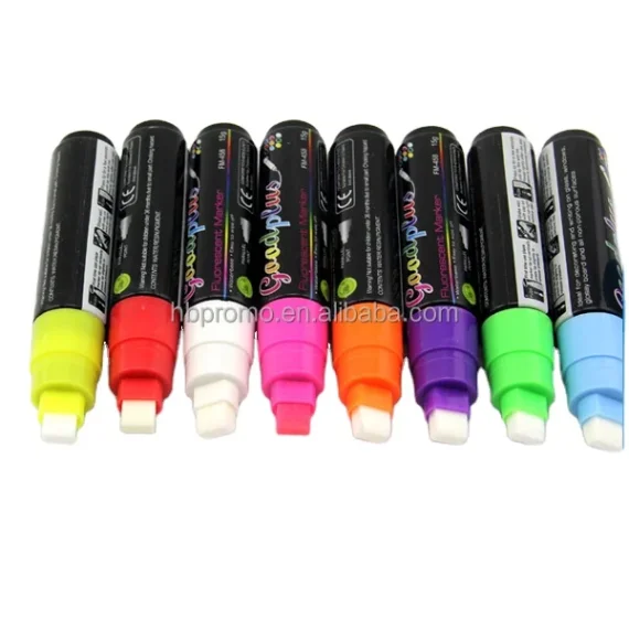 Marker pen and design tools on a table.