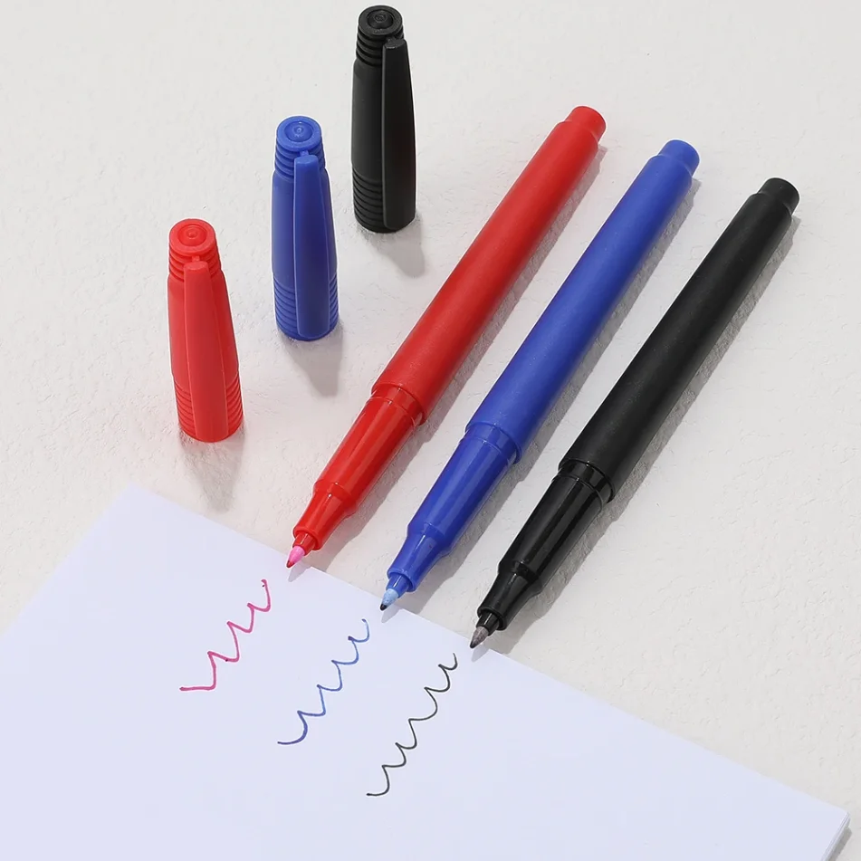 Collection of art markers in assorted colors.