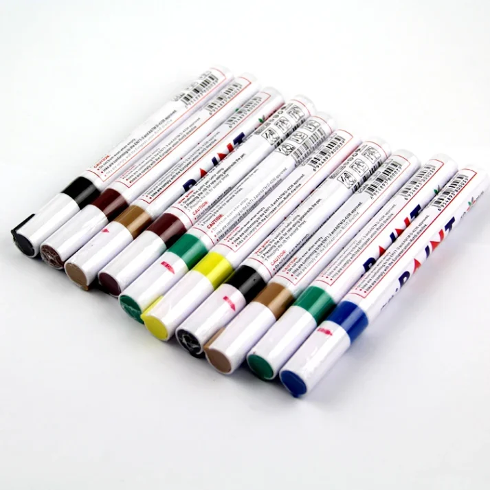 Art supplies including a variety of marker pens.