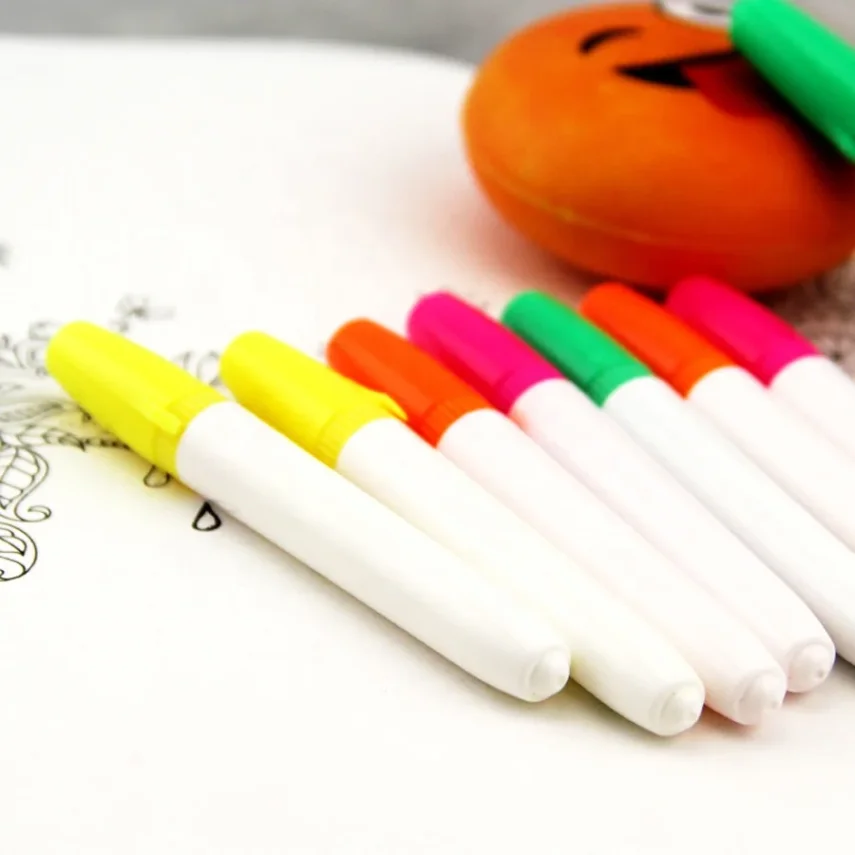 Marker pens alongside other art supplies.