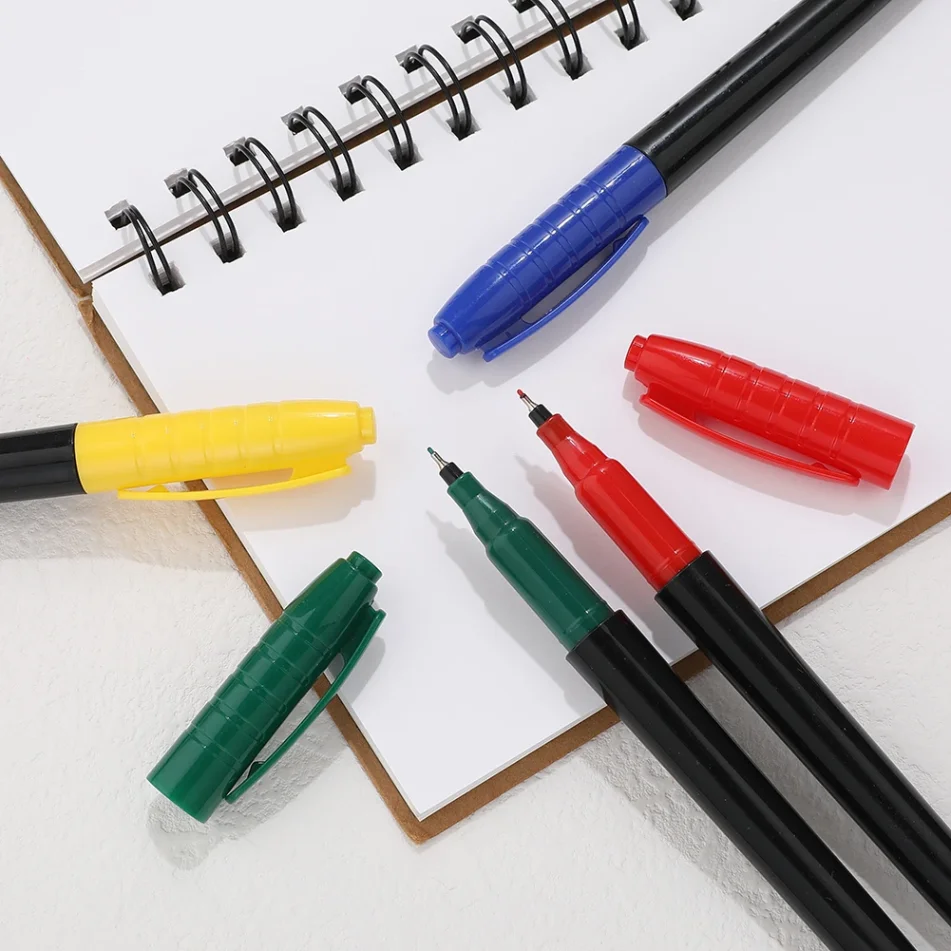 Marker pen and design tools on a table