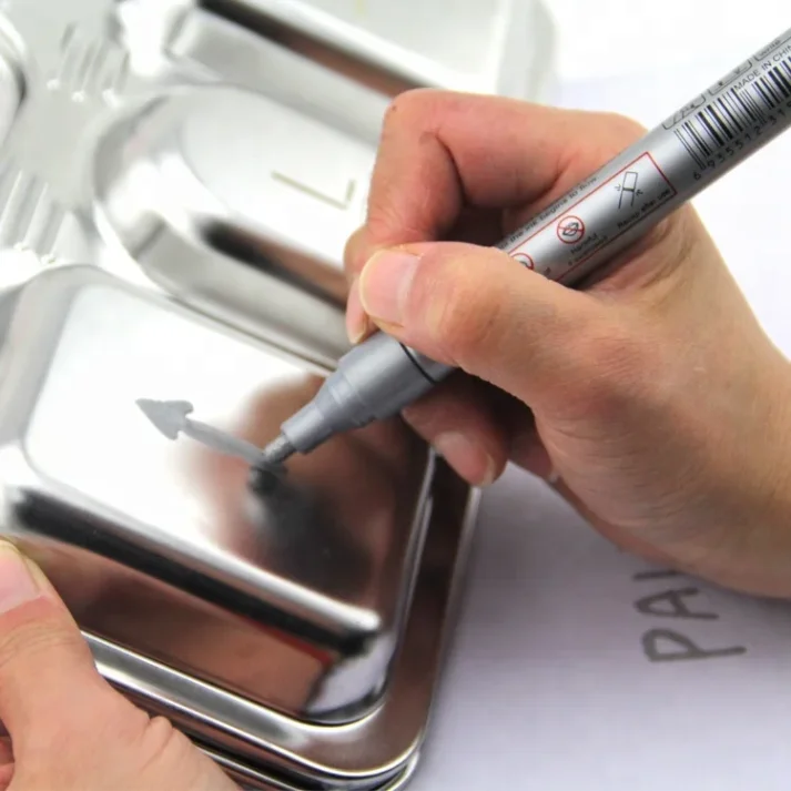 A collection of fine-tip marker pens for detailed work