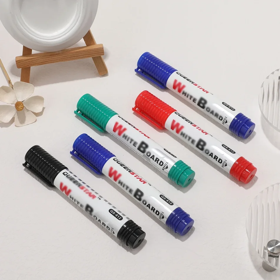 Assortment of art markers in various colors and sizes.