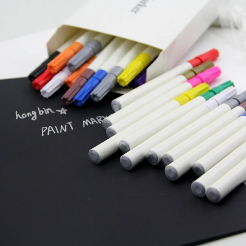 High-quality marker pens and design tools on a white background