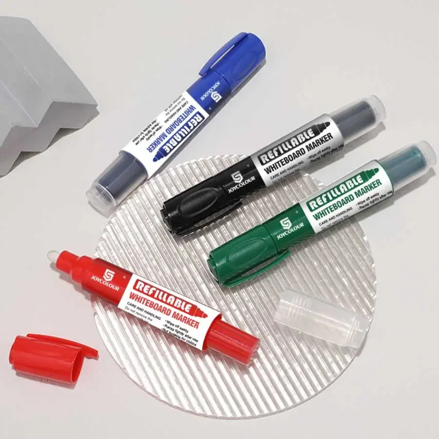 A collection of marker pens in various colors and sizes.