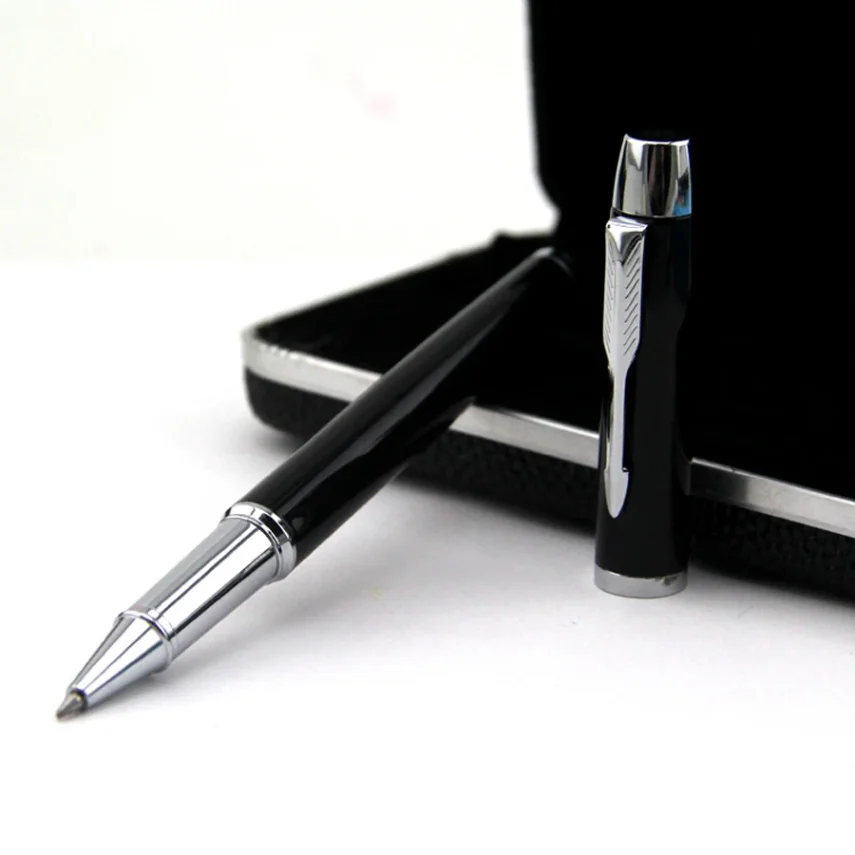 Drawing tools including marker pens on a desk.