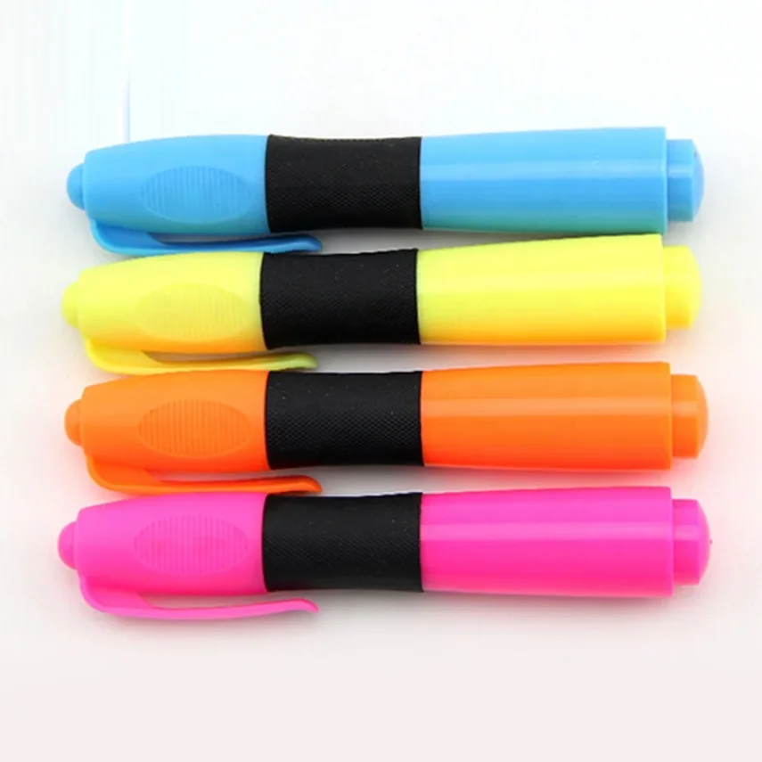 Collection of art supplies including marker pens