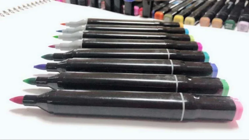 Professional drawing kit with markers, pencils, and rulers