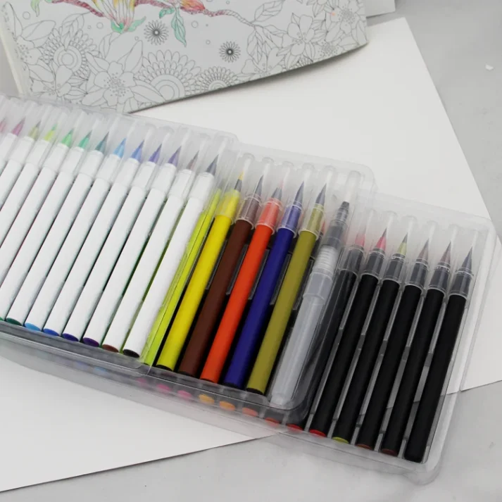 Artist using marker pens for sketching