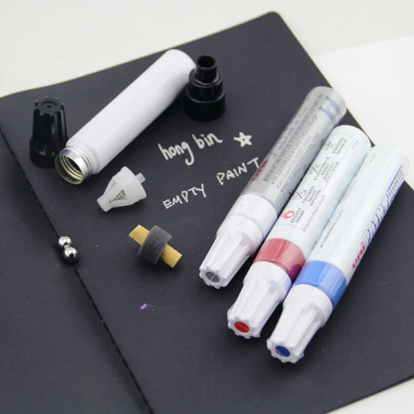 Assorted art supplies including a marker pen set